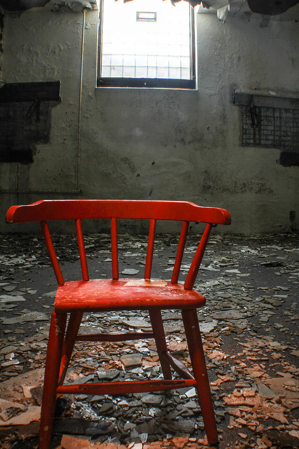 Abandoned red chair  Photograph by John McGraw
