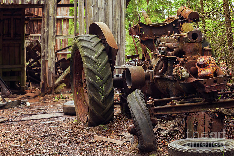 Abandoned rusty tractor Photograph by Sophie McAulay