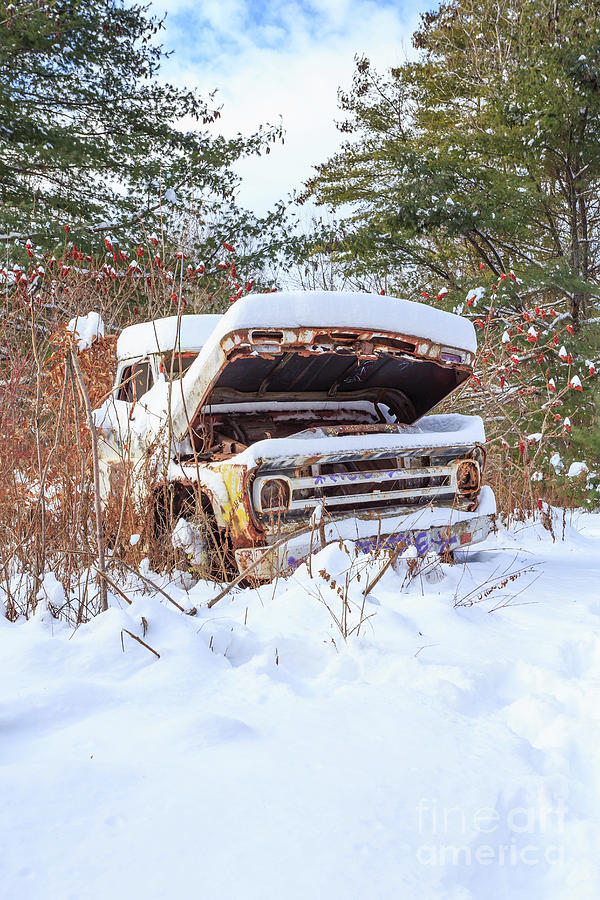 Abandoned truck in the snow Photograph by Edward Fielding
