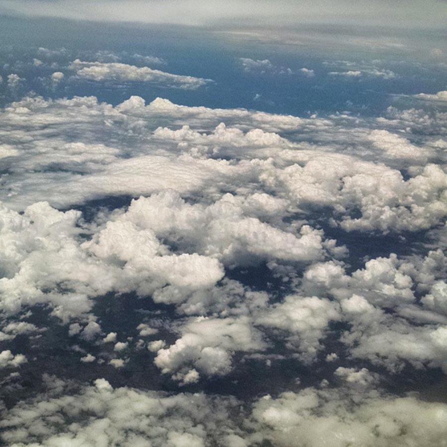 Nature Photograph - Above The Clouds From Our Flight To San by Melissa Yosua-Davis