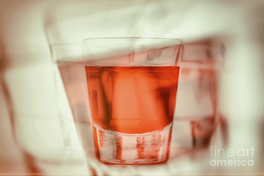 Abstract first person perspective of being drunk and reaching for another glass of alcohol Photograph by Michal Bednarek