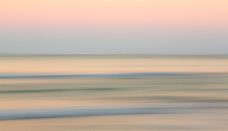 Abstract rising sun over ocean Photograph by Steven Heap
