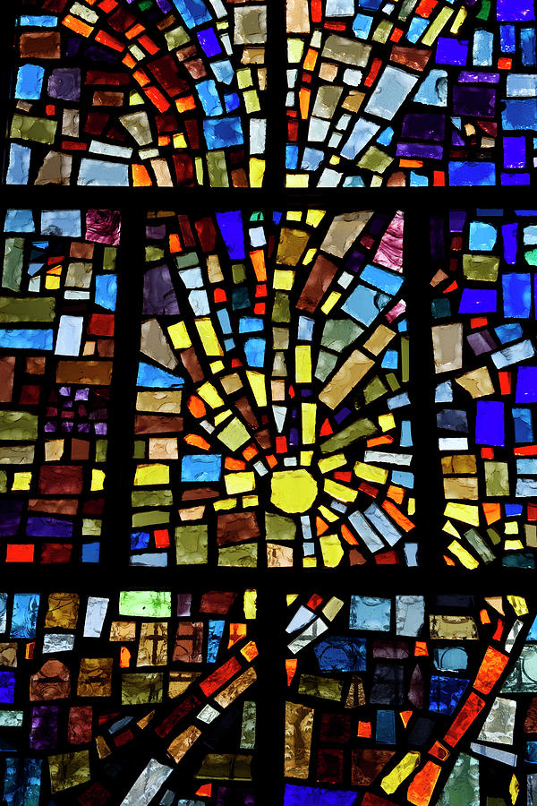 Abstract Sun Pattern Of Colors In A Stained Glass Window Mosaic