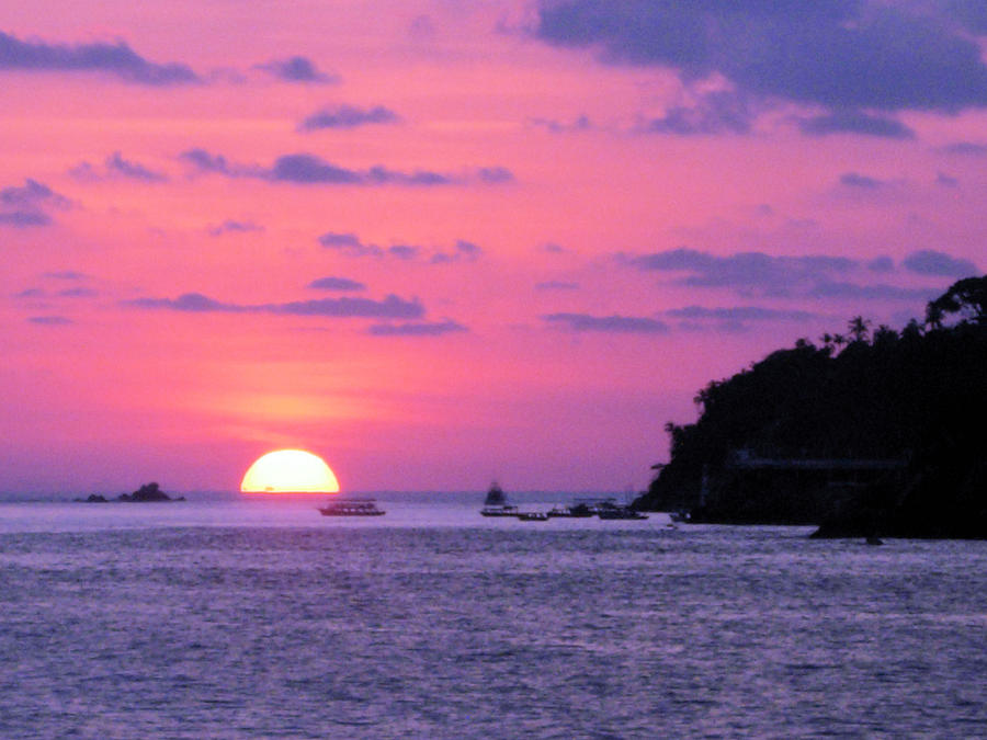 Sunset Photograph - Acapulco Haze by Robert Boyette