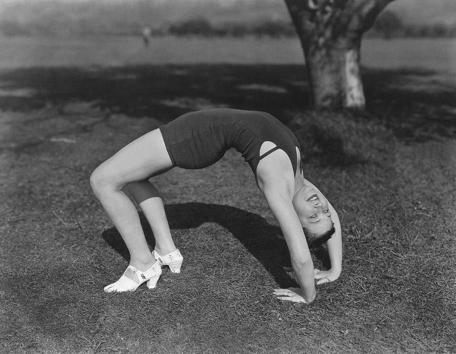 Hollywood Photograph - Actress Does Backbend by Underwood Archives