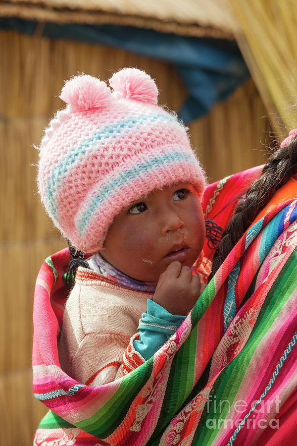 Adorable baby in colorful cloth in Peru Photograph by Patricia Hofmeester