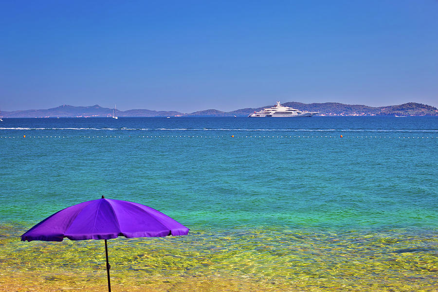 Adriatic beach in Zadar with megayacht background Photograph by Brch Photography