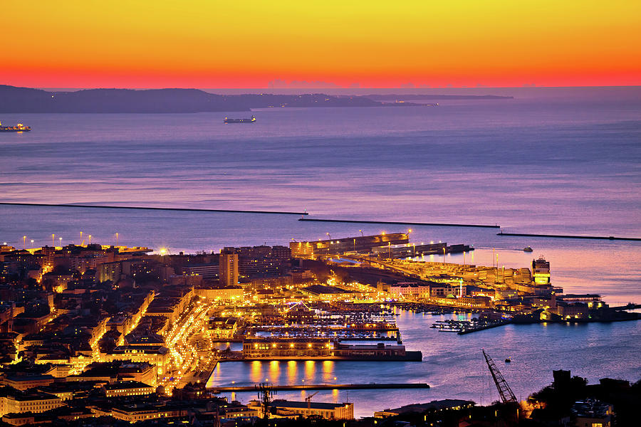 Aerial evening view of Trieste city center and waterfront  Photograph by Brch Photography