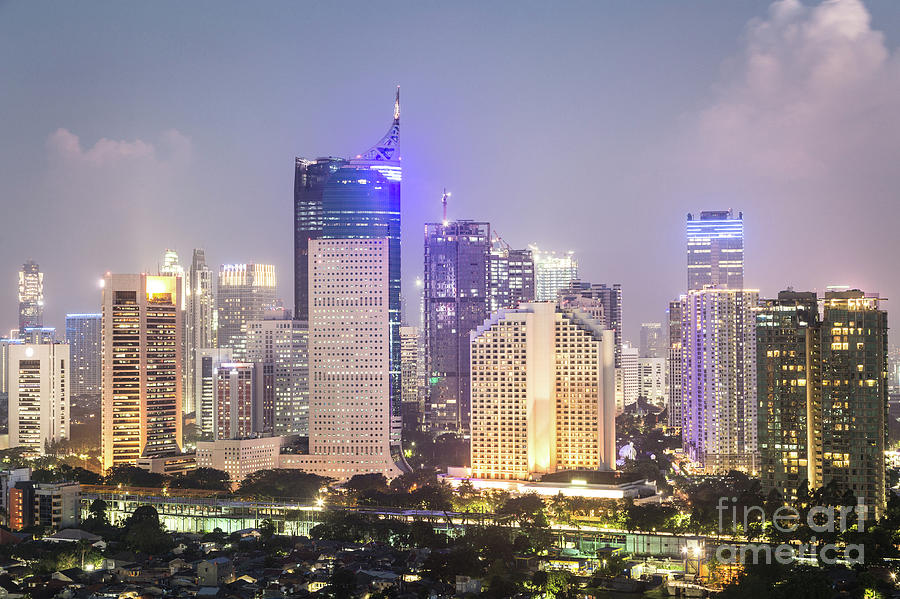 Aerial night view of Jakarta urban skyline in Indonesia Photograph by Didier Marti