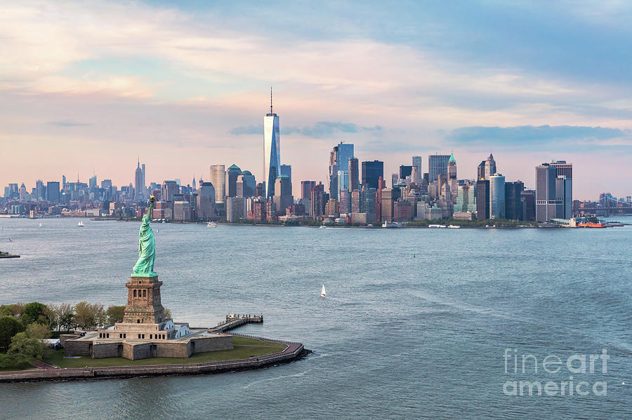 Aerial of the Statue of Liberty and Manhattan skyline, New York, Photograph by Matteo Colombo
