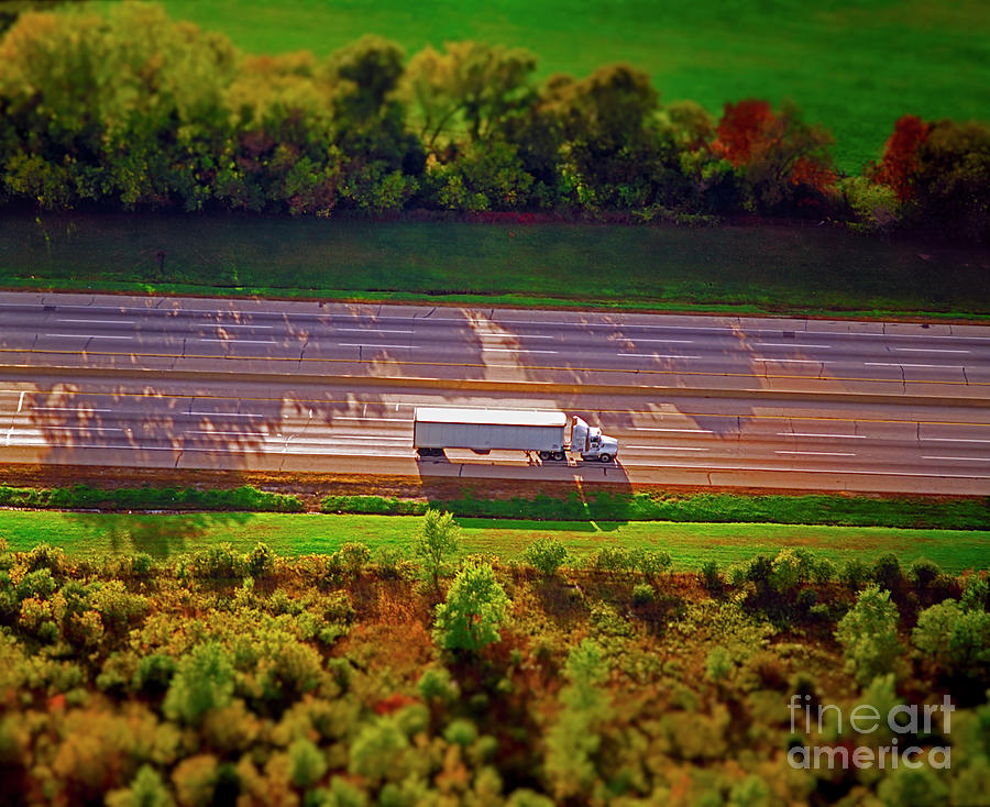 Aerial of truck on interstate transportation freight  Photograph by Tom Jelen