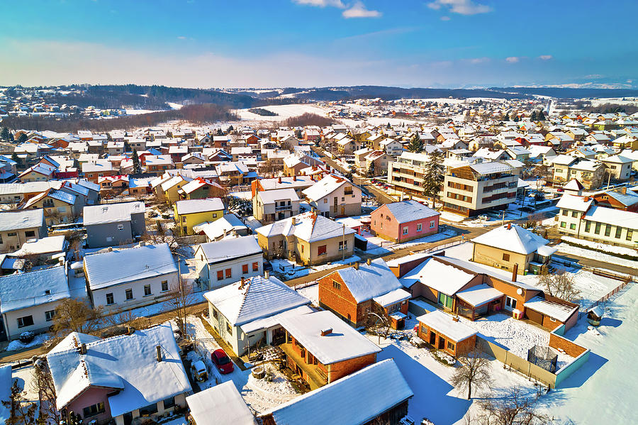 Aerial snowy winter view of Krizevci Photograph by Brch Photography