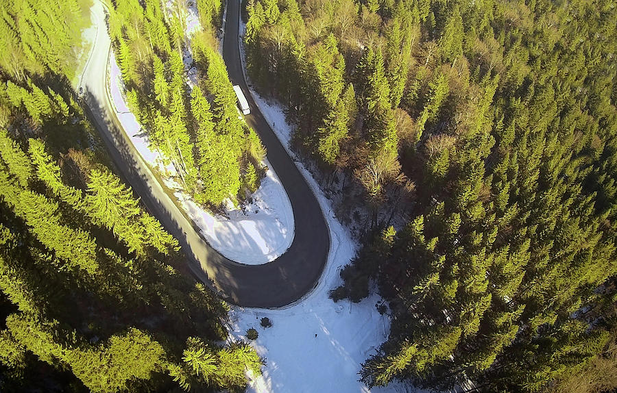 Aerial View Of Curved Road In Forest Seen From Drone Photograph by Ioan ...