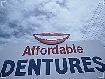 Sign Photograph - Affordable Dentures- the signs of the times collection by The Signs Of The Times Collection