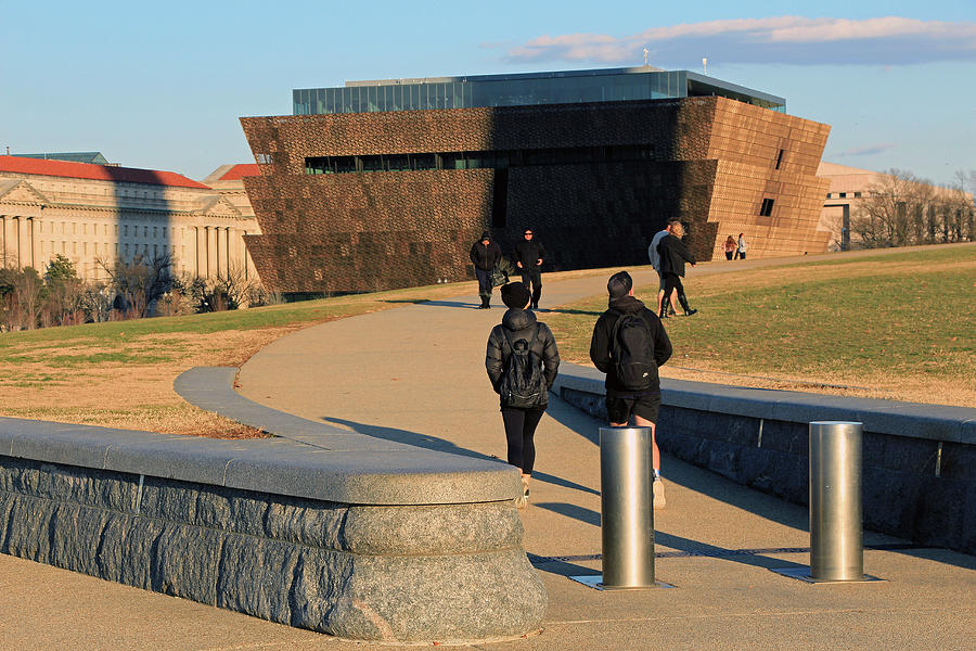African American History And Culture Museum In The Dark Shadow Of The Washington Monument Photograph