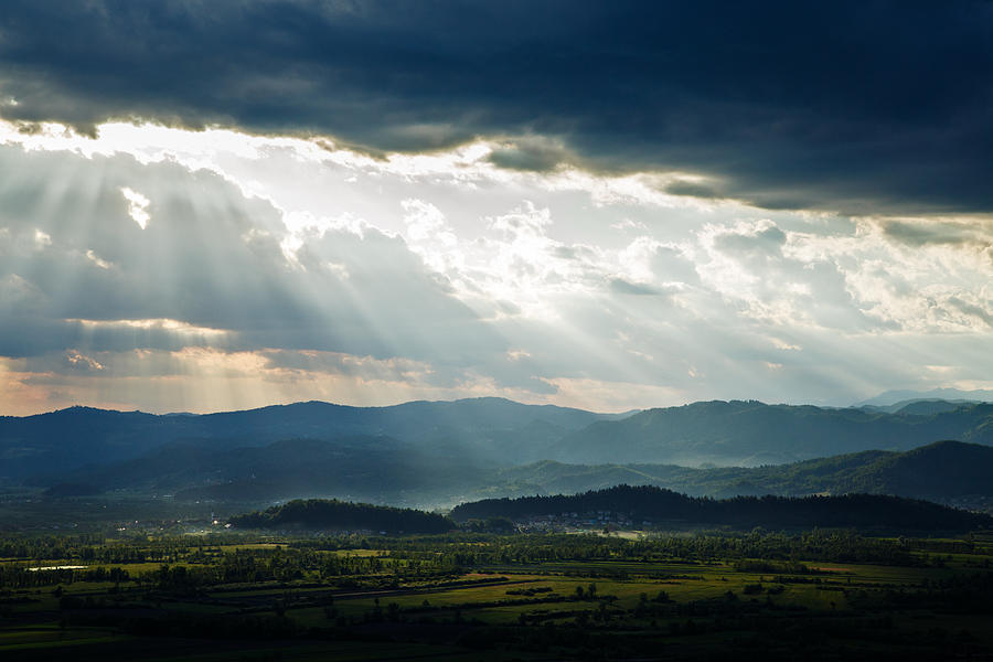 Afternoon rays over the Ljubljana Moors Photograph by Ian Middleton