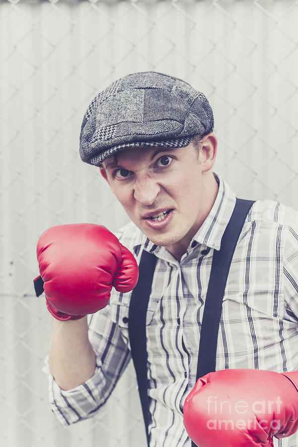 Aggressive boxer wearing 1920s flat cap Photograph by Jorgo Photography