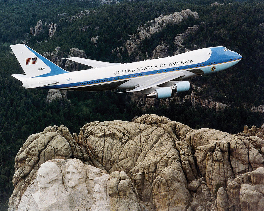 Air Force One flying over Mount Rushmore Photograph by War Is Hell Store