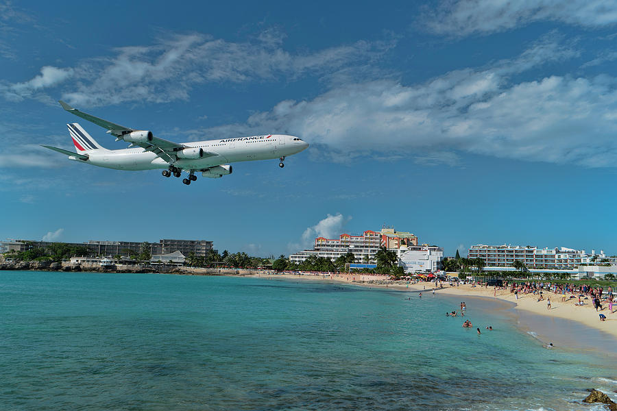 Sunset Photograph - Air France landing at St. Maarten airport. by David Gleeson
