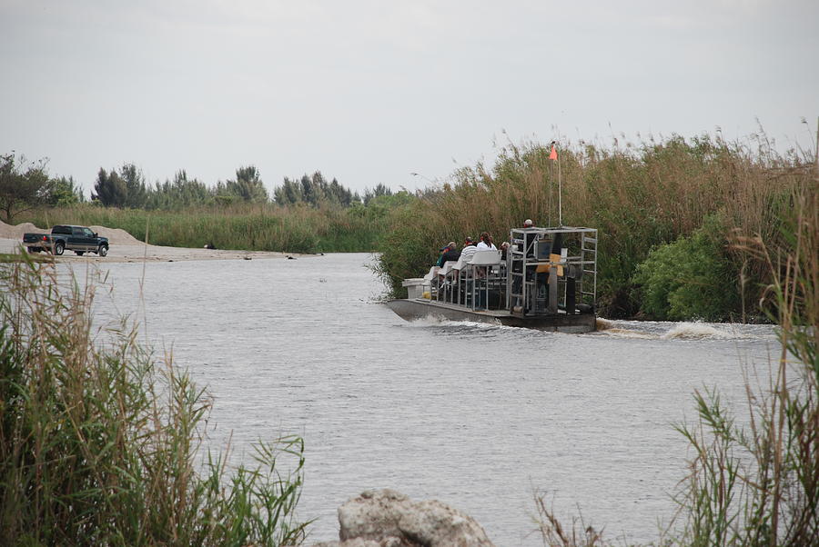 Airboat Rides 25 Cents Photograph by Rob Hans