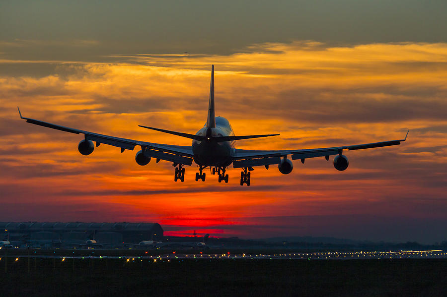 Aircraft at Sunset Photograph by Ian Schofield - Pixels