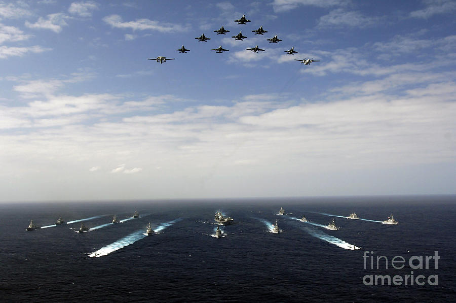 Boat Photograph - Aircraft Fly Over A Group Of U.s by Stocktrek Images