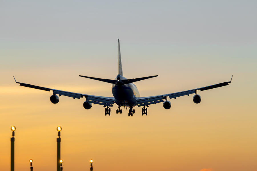 Aircraft Landing at Sunset Photograph by Derek Beattie | Fine Art America