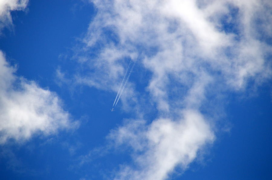 Airplane Flying Through the Clouds Photograph by Kate Scott - Fine Art ...