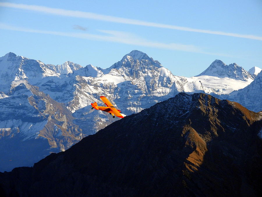 Airplane In Front Of The Alps Photograph