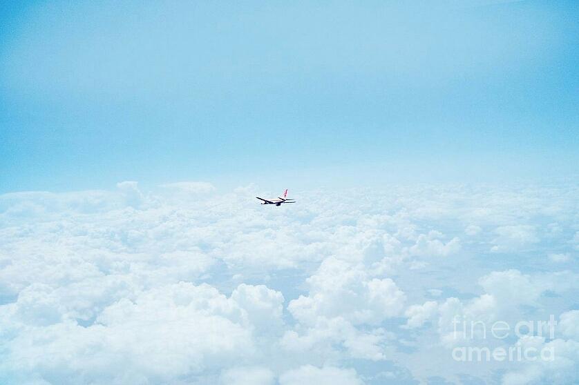 Airplane in the clouds by Joyce A Rogers Airplane in the clouds by Joyce A Rogers