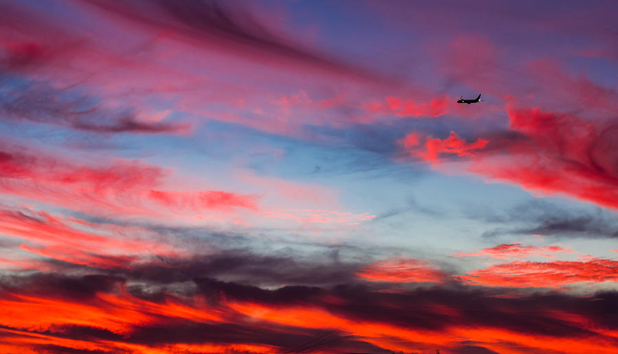 Airplane in the Sunset Photograph by April Reppucci