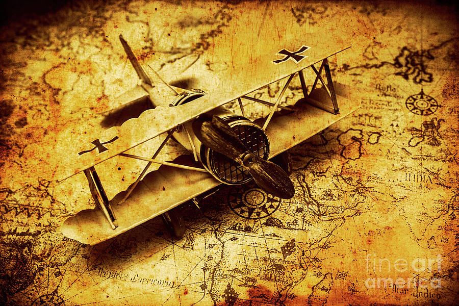 Airplane war bomber miniature on vintage map Photograph by Jorgo Photography
