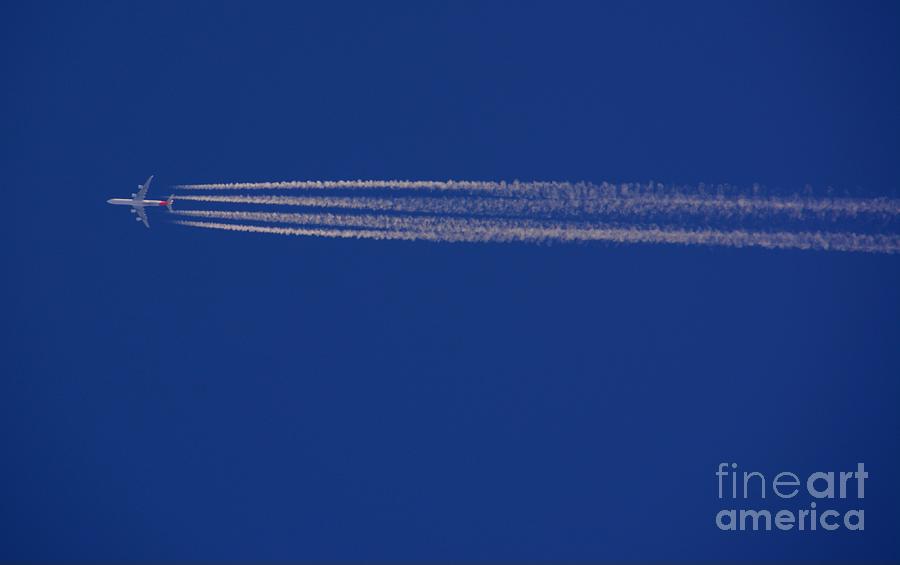 Airplane with Chemtrails Photograph by Adrian De Leon Art and Photography