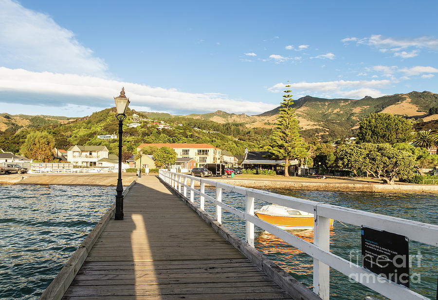 Akaroa village in the Banks peninsula in New Zealand Photograph by Didier Marti