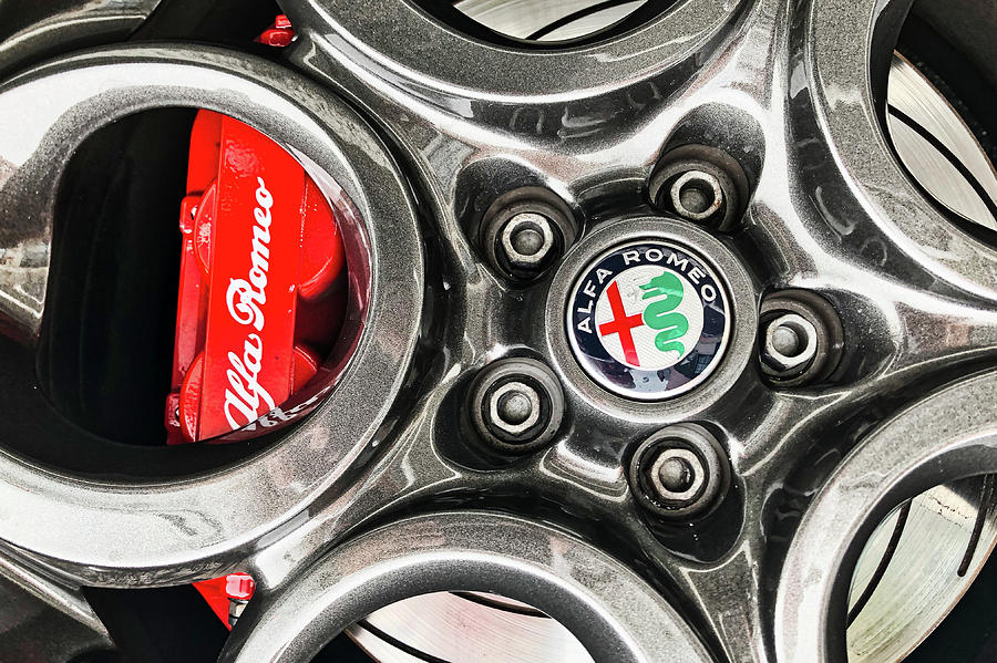 Alfa Romeo Wheel Photograph by Jerry Fornarotto