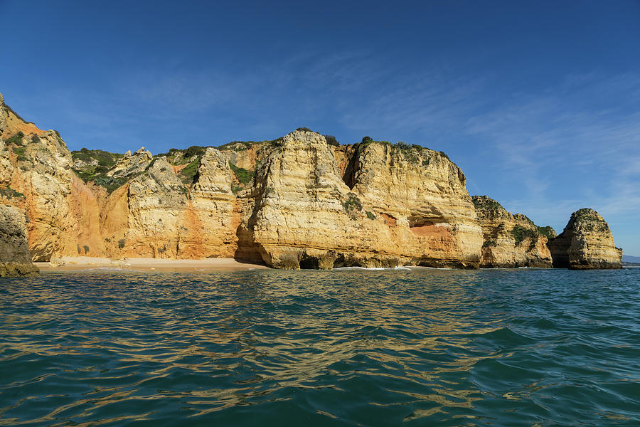 Algarve Magic - Sailing by Colorful Cliffs and Secluded Beaches Photograph by Georgia Mizuleva