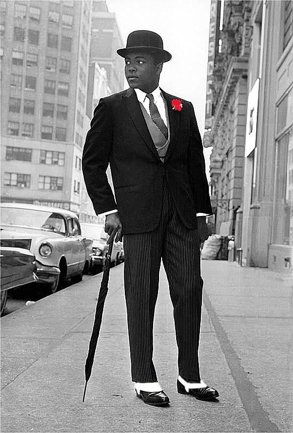 Ali in London after Saville Row fittings 1963-2008 Photograph by David Lee Guss