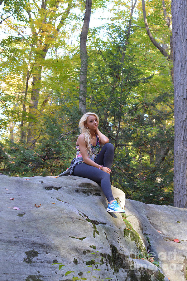 Ally at Coopers Rock in the fall on a rock Photograph by Dan Friend