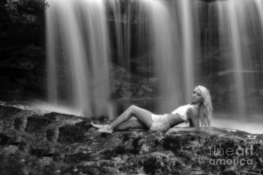Ally laying down in front of waterfall Photograph by Dan Friend