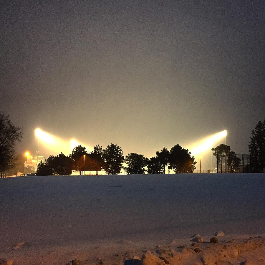 Alma College Bahlke Field Snow at Night Photograph by Chris Brown