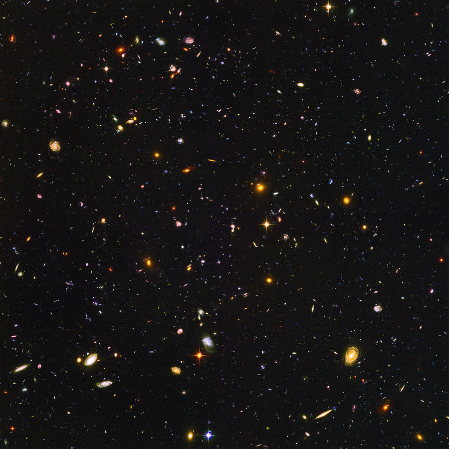 Space Photograph - Almost Ten Thousand Galaxies As Seen By Hubble by Carl Deaville