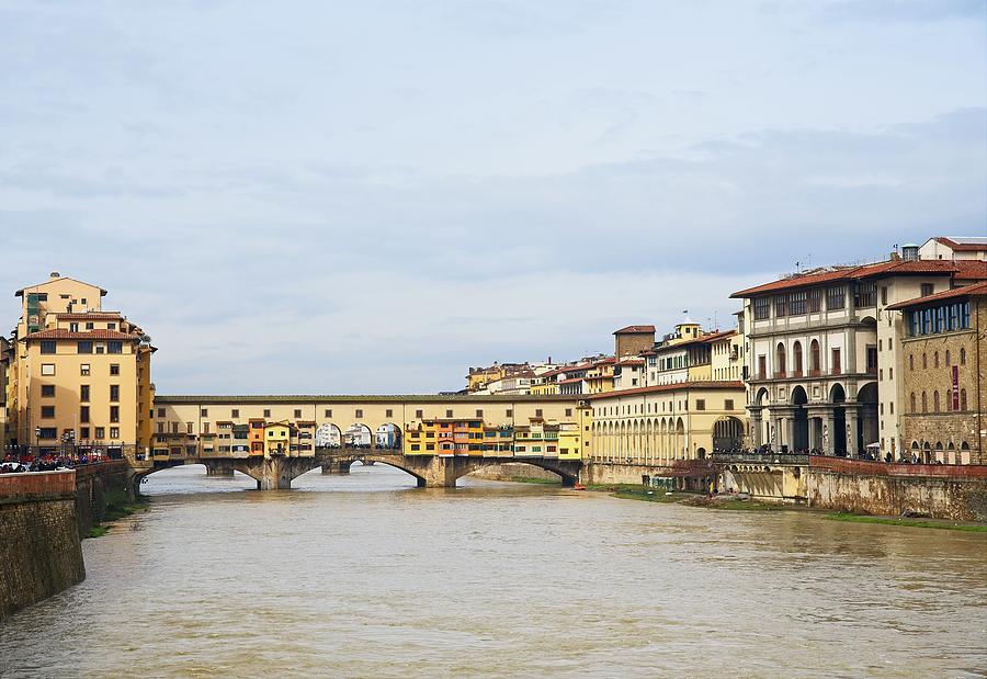 The Arno And Ponte Vecchio Photograph by Allan Van Gasbeck