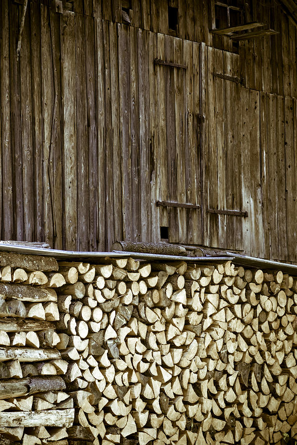 Alpine Firewood Storage Barn Photograph by Frank Tschakert