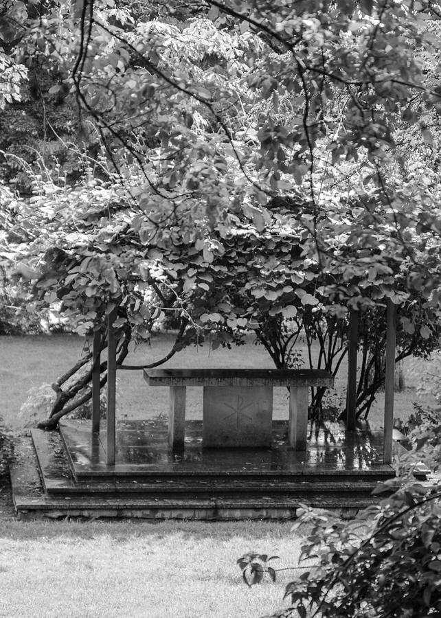 Altar in the garden Photograph by Tom Potter