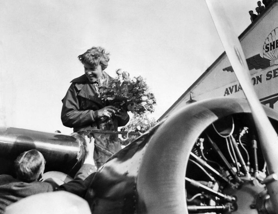 Flower Photograph - Amelia Earhart Shown Just After Landing by Everett