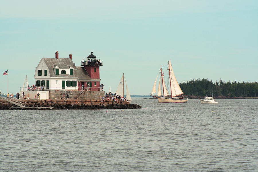 American Eagle Passing The Lighthouse Photograph by Doug Mills
