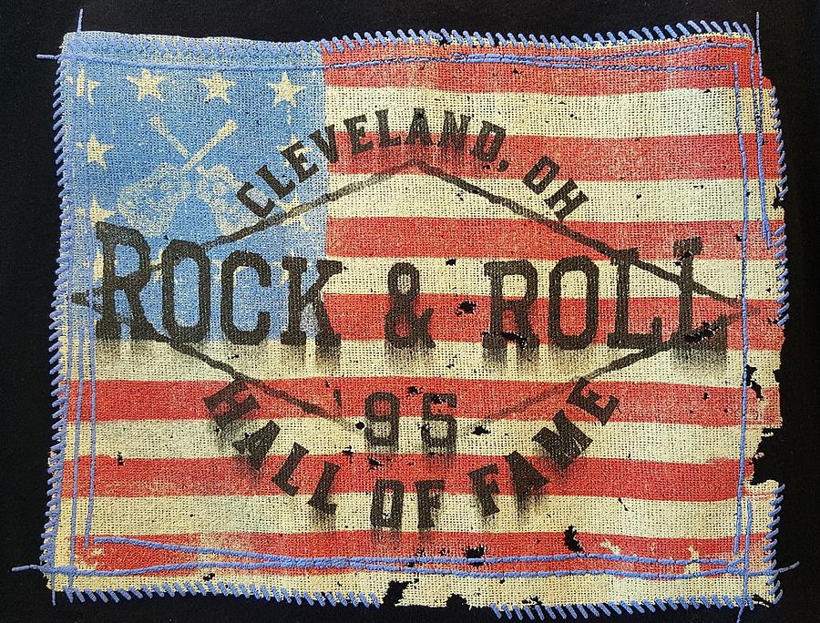 American Flag And The Rock And Roll Hall Of Fame Photograph