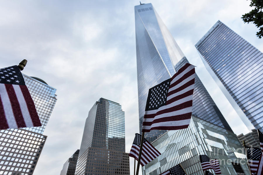 American flag in front of the One World World trade Center Photograph by Didier Marti