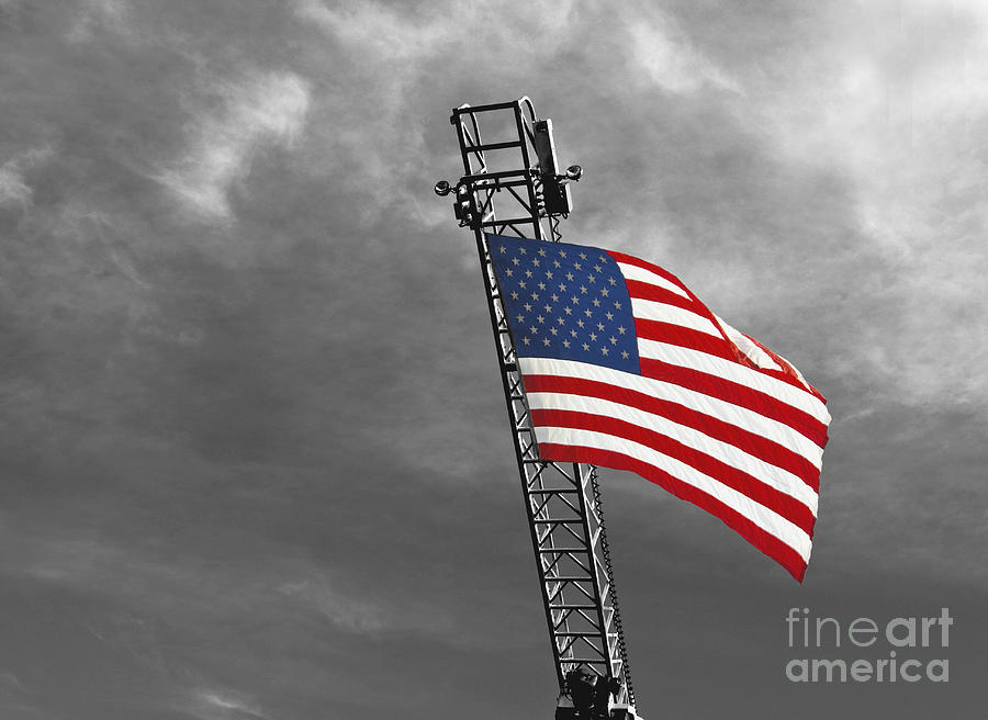 american flag on a fire truck ladder mark hendrickson