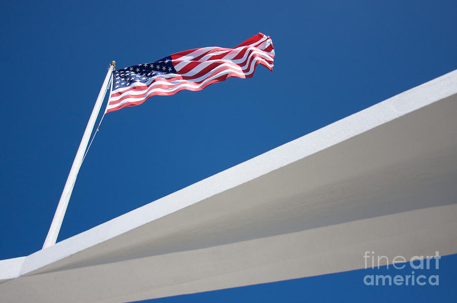 American Flag over Pearl Harbor Photograph by J Bloomrosen